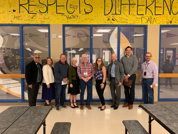From left, Raul Sital, assistant superintendent, operations; Amy Phillips, president, Pasco SD board of directors; Sen. Boehnke; Michelle Whitney, superintendent; Mitch Denning, WAMOA consultant; Julia Dudley, principal; Steven Clark, Integrus Architects, Assn for Learning Environments (A4LE) representative; Kyle Lepper, LPR Architecture, American Institute of Architects (AIAWA) representative; and Josh Collop, manager, maintenance and custodial. Not shown are Kevin Hebdon, executive director, fiscal services; and Carla Lobos, assistant superintendent, instructional services.